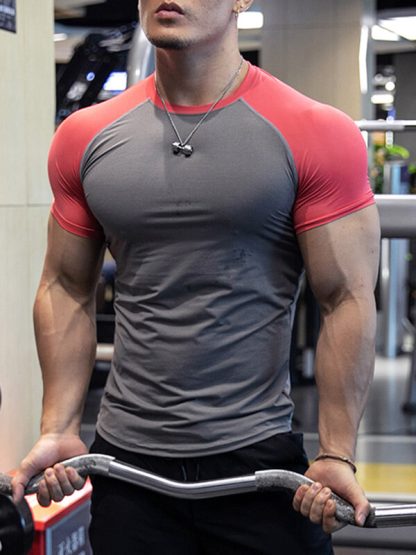 Wholesale men sports t shirts raglan sleeve splicing gym round neck top